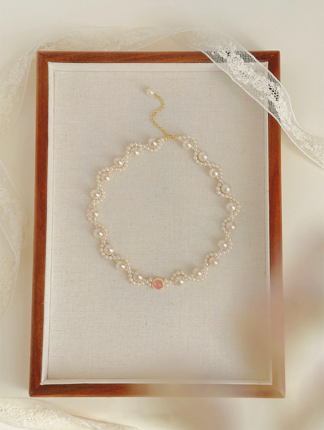 COLLIER VAGUE D'EAU ROSE