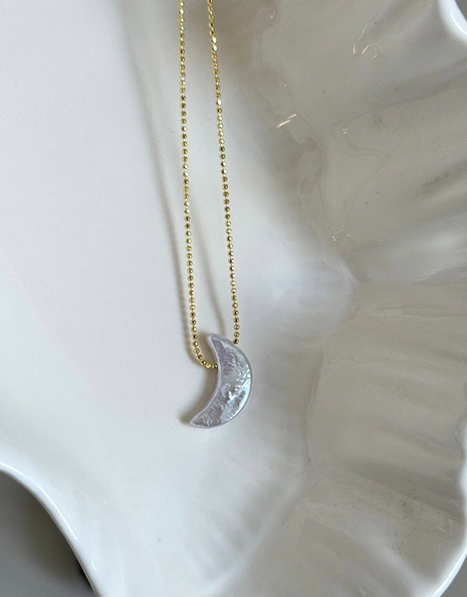 COLLIER DE PERLES LUMINEUSES