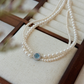 BLUE ENTANGLEMENT NECKLACE