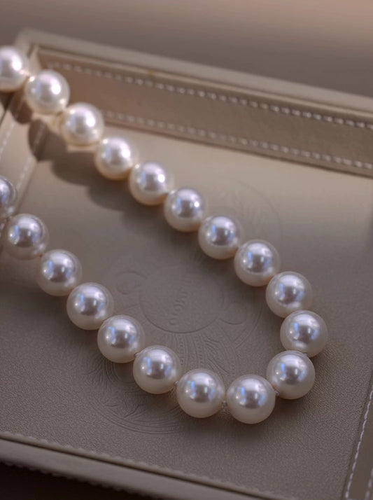 PEARL DOLL NECKLACE