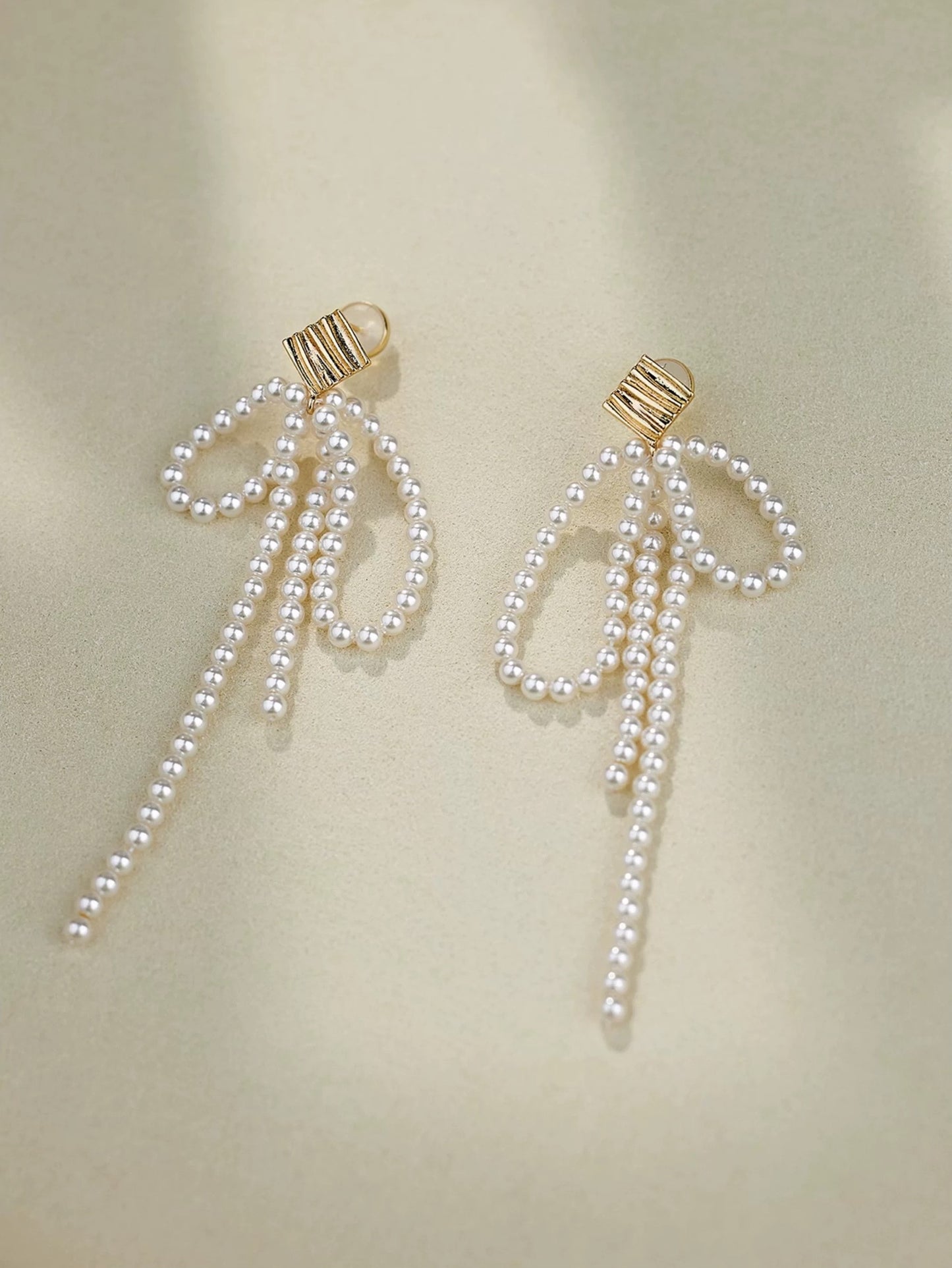 BOUCLES D'OREILLES EN PERLES ECHOING