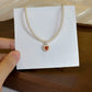 CORAL KISS NECKLACE