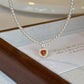 CORAL KISS NECKLACE