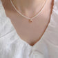 CORAL KISS NECKLACE