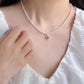CORAL KISS NECKLACE