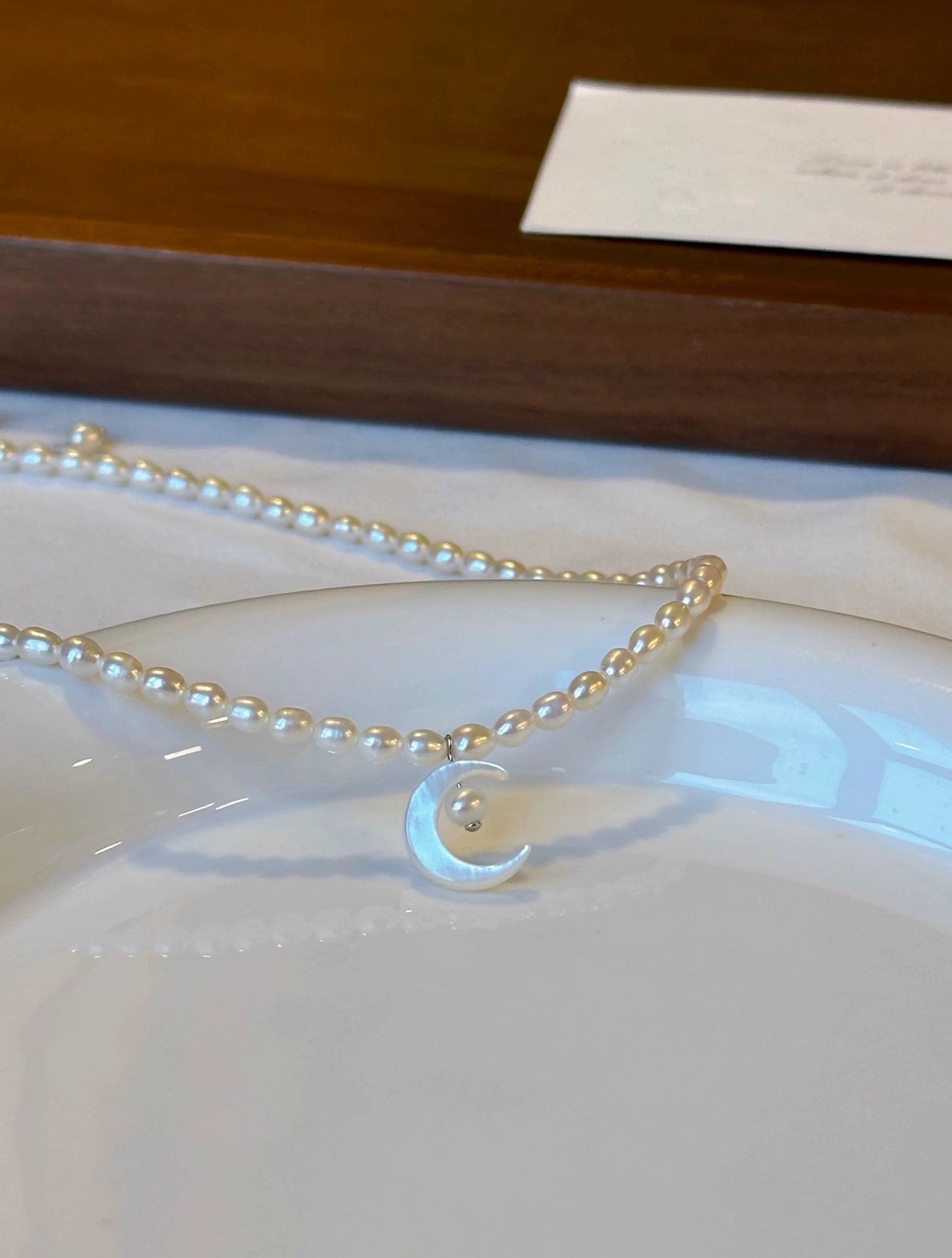 REFLECTED MOON NECKLACE