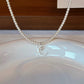 REFLECTED MOON NECKLACE