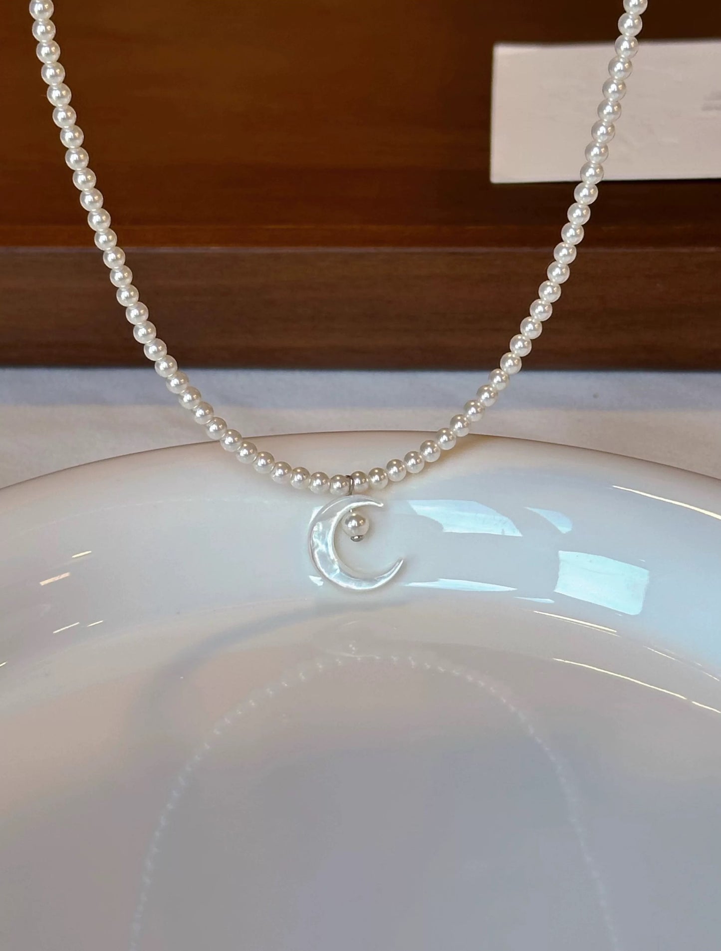 REFLECTED MOON NECKLACE