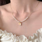 RAY OF QUIET NECKLACE