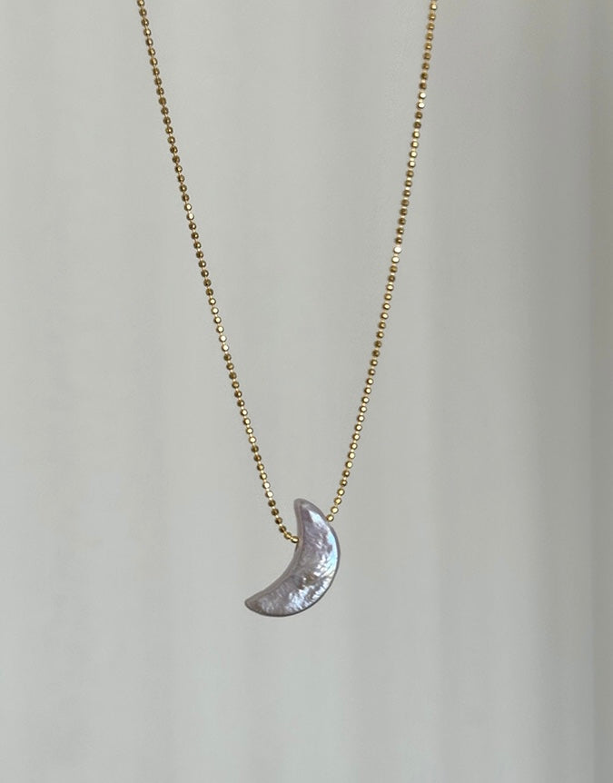 COLLIER DE PERLES LUMINEUSES