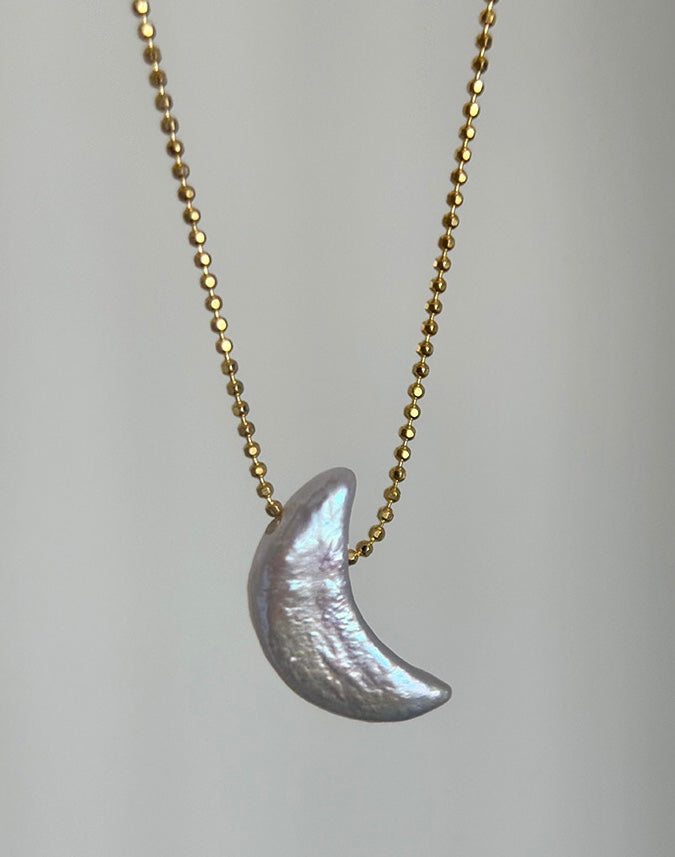 COLLIER DE PERLES LUMINEUSES