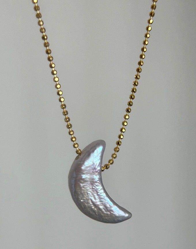 COLLIER DE PERLES LUMINEUSES