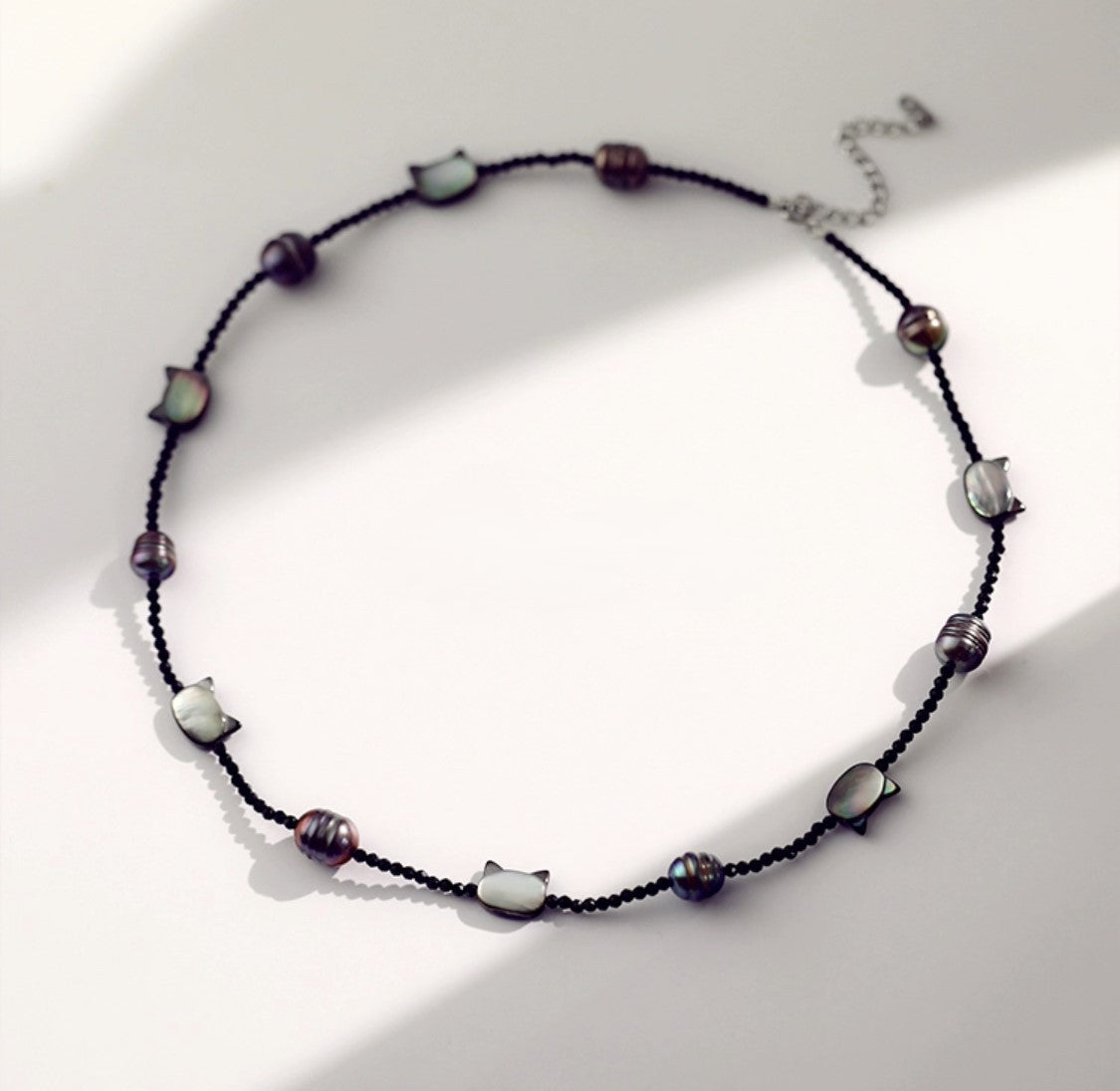 COLLIER DE PERLES CHATON