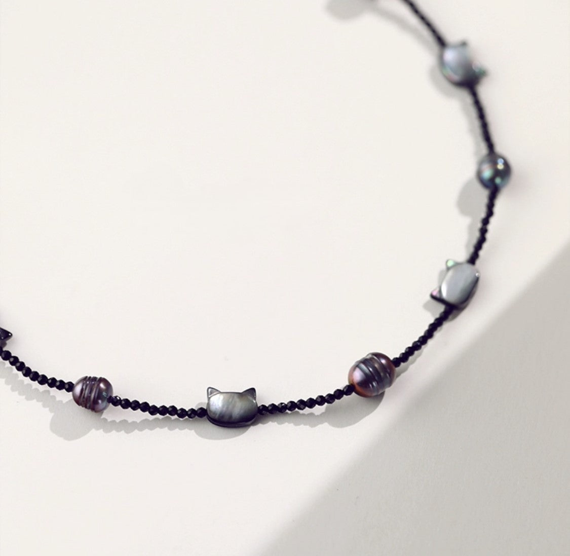 COLLIER DE PERLES CHATON